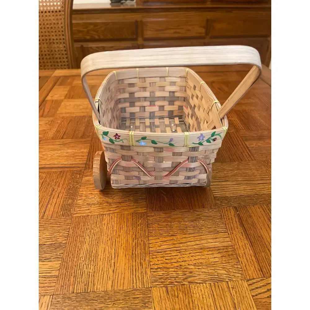 Woven wicker Easter pushcart basket with wooden wheels
